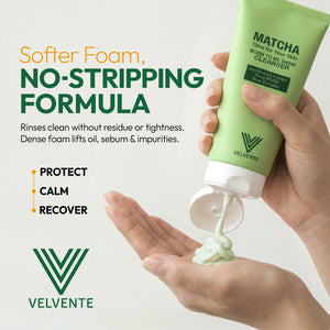 Green Velvente skincare cleanser product being held with formula on palm, dense foam lifts oil, sebum and impurities